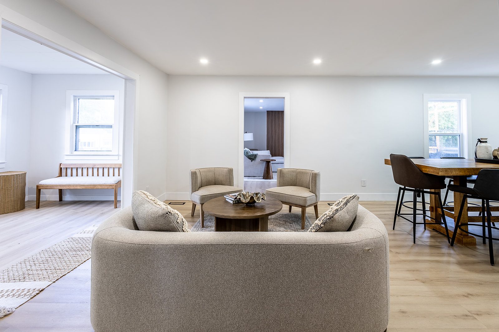 Living room toward dining and hallway
