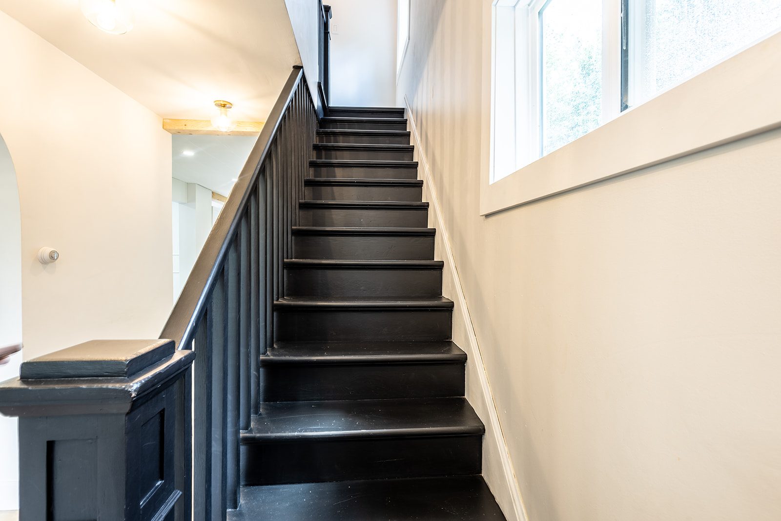 Black staircase to second floor